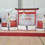 Wiktor i Filip na podium Ogólnopolskiego Turnieju Judo Olimpiad Specjalnych.jpg